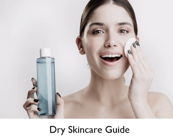 How To Care For Dry Skin | Woman holding toning pad to cheek and smiling